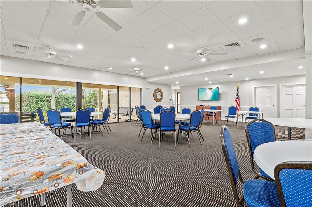 6687 Huntley Lane South Naples, FL 34104 - Photo 35 of 37 a view of a dining room with furniture window and outside view