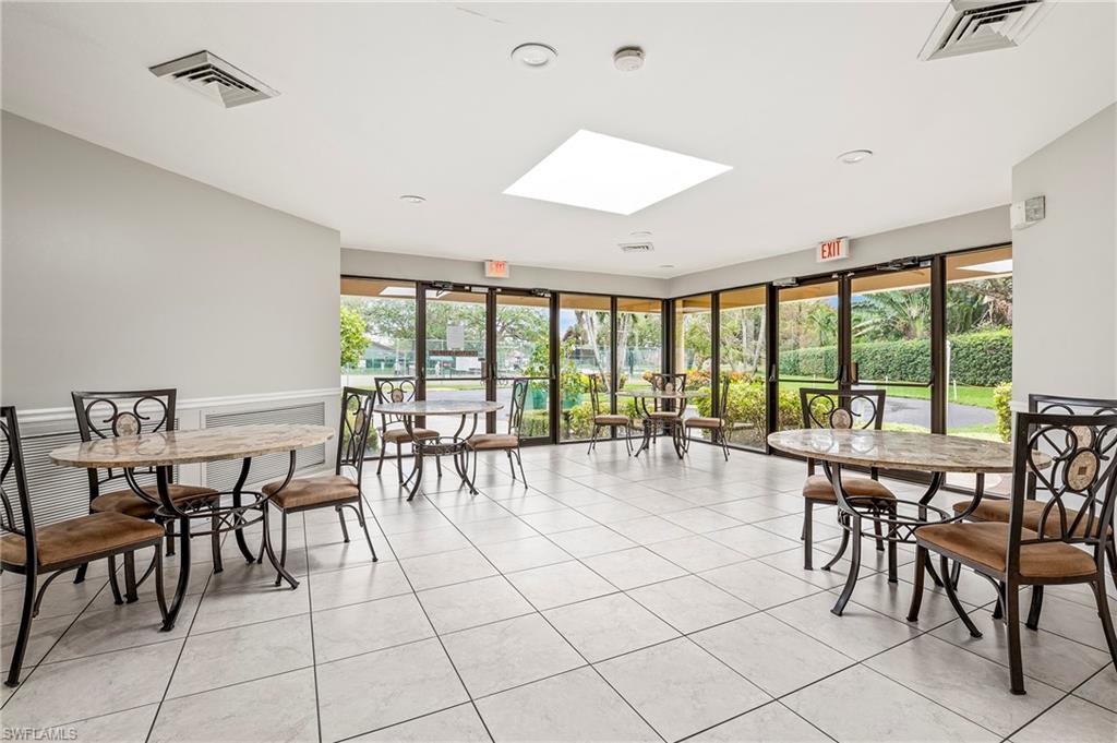6687 Huntley Lane South Naples, FL 34104 - Photo 37 of 37 a very nice looking living room with a large window