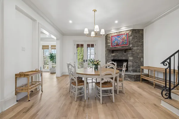 a kitchen with granite countertop a stove sink and cabinets
