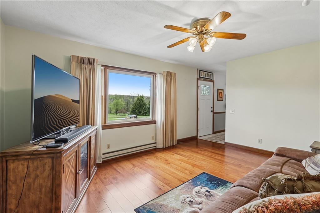 240 Hamburg Road Greenville, PA 16125 - Photo 8 of 41 The living room has a large picture window with great wood views