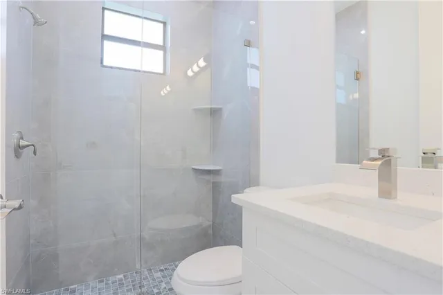 a kitchen with a refrigerator stove and microwave