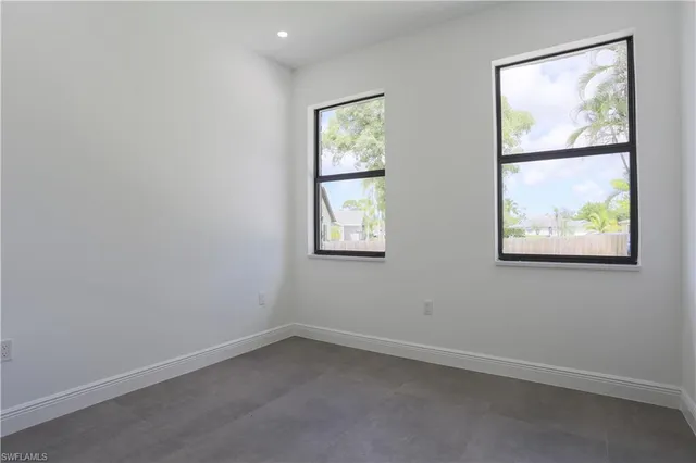 a view of a back yard of the house