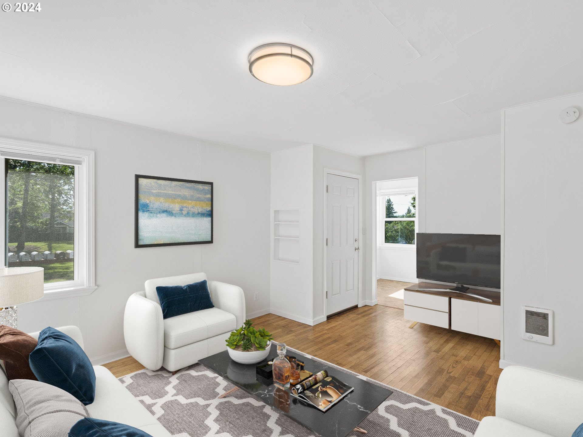 2311 Southwest 6th Avenue, Unit 6 Camas, WA 98607 - Photo 13 of 32 a living room with furniture and wooden floor