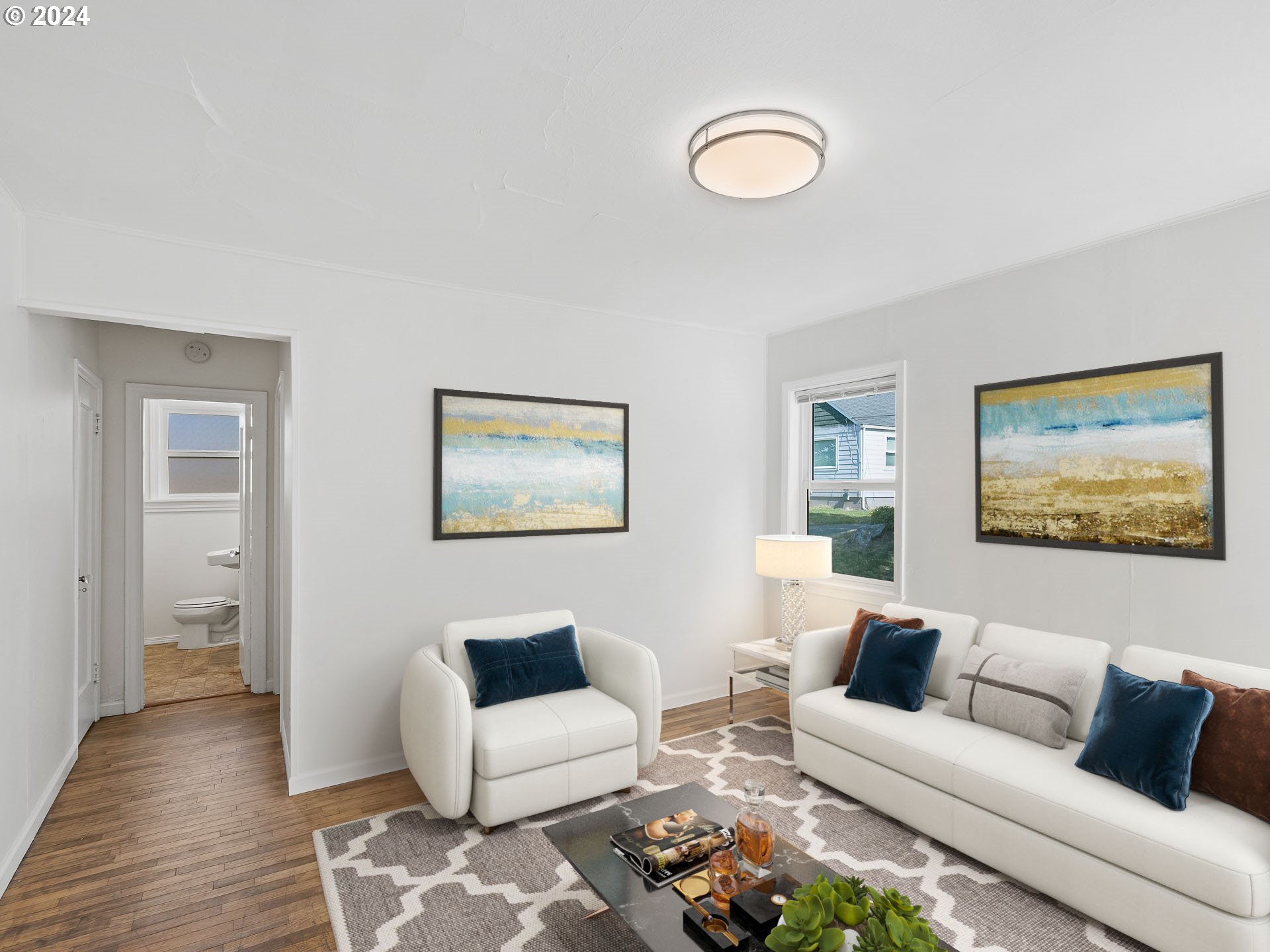 2311 Southwest 6th Avenue, Unit 6 Camas, WA 98607 - Photo 14 of 32 a living room with furniture and wooden floor