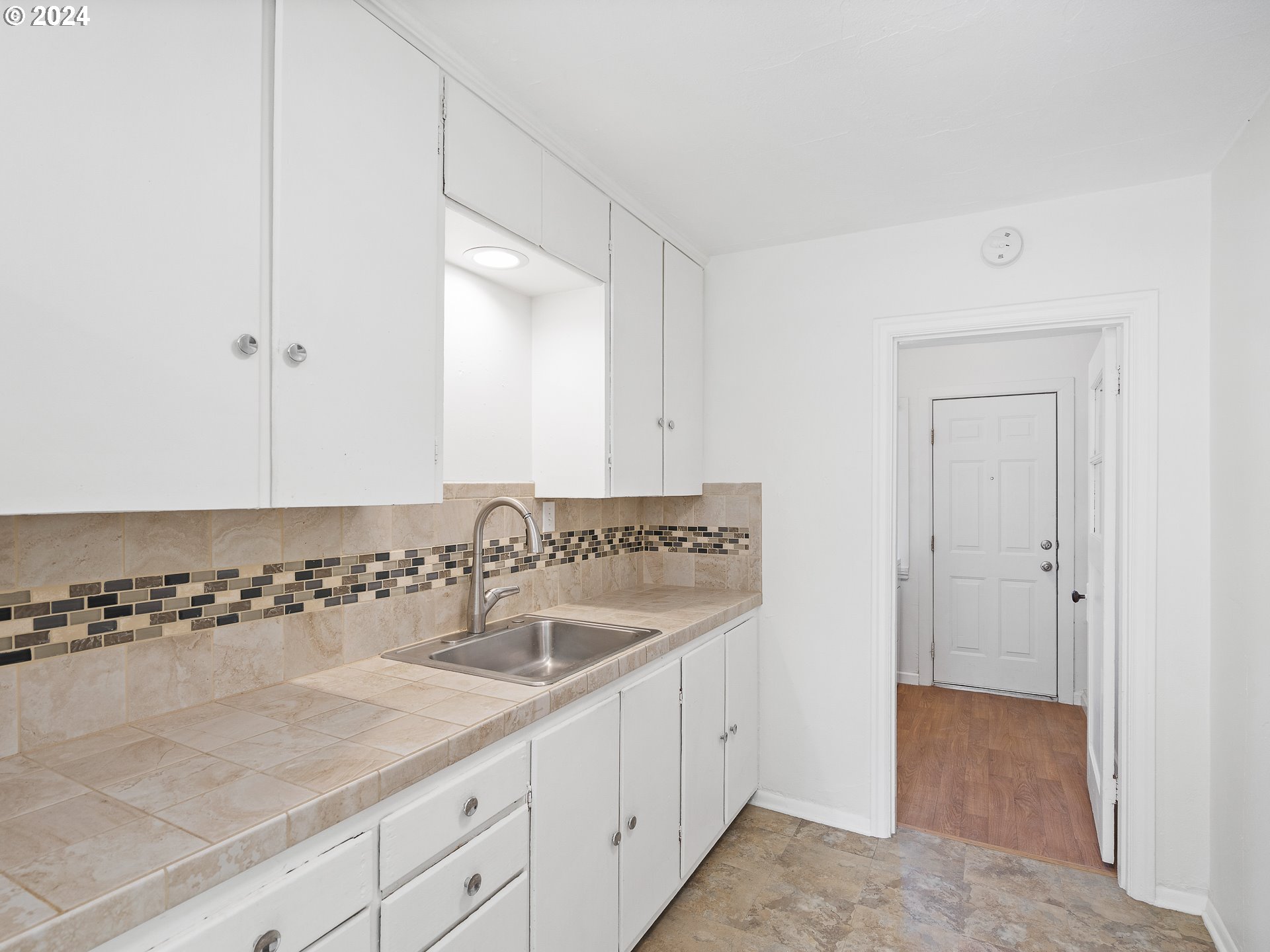 2311 Southwest 6th Avenue, Unit 6 Camas, WA 98607 - Photo 19 of 32 a bathroom with a sink and a mirror