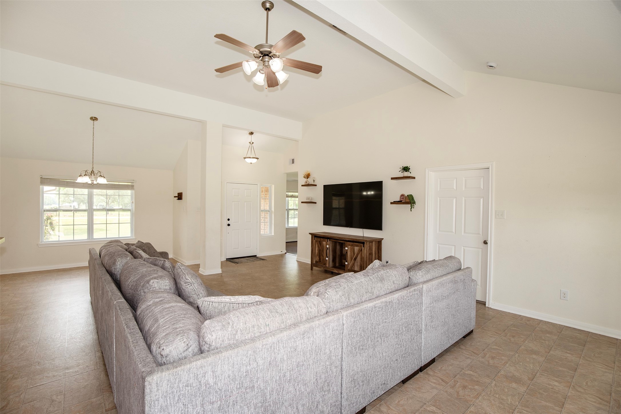6105 Del Bello Boulevard Manvel, TX 77578 - Photo 13 of 37 a living room with furniture and a flat screen tv