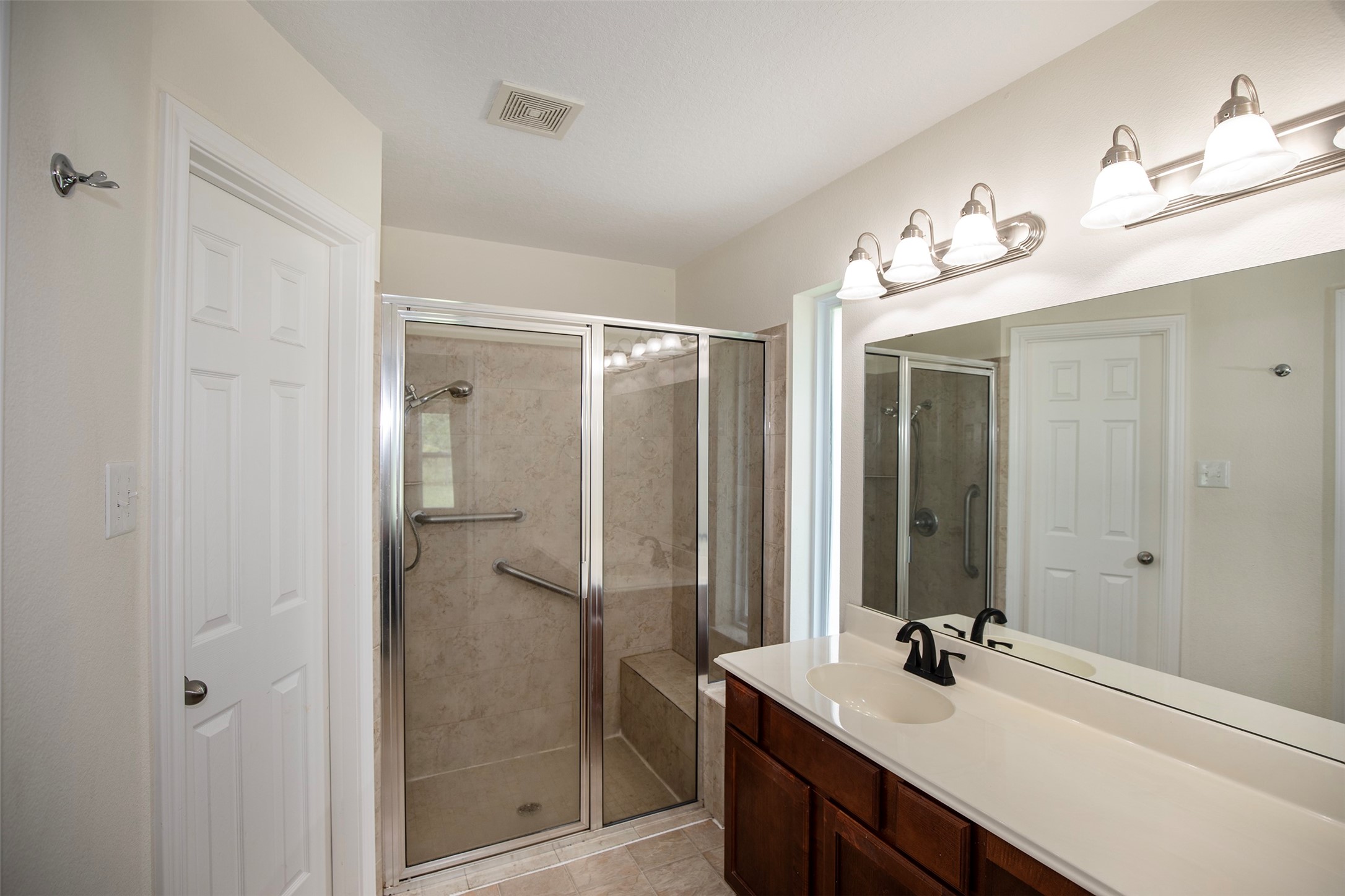 6105 Del Bello Boulevard Manvel, TX 77578 - Photo 24 of 37 a bathroom with a double vanity sink mirror and shower