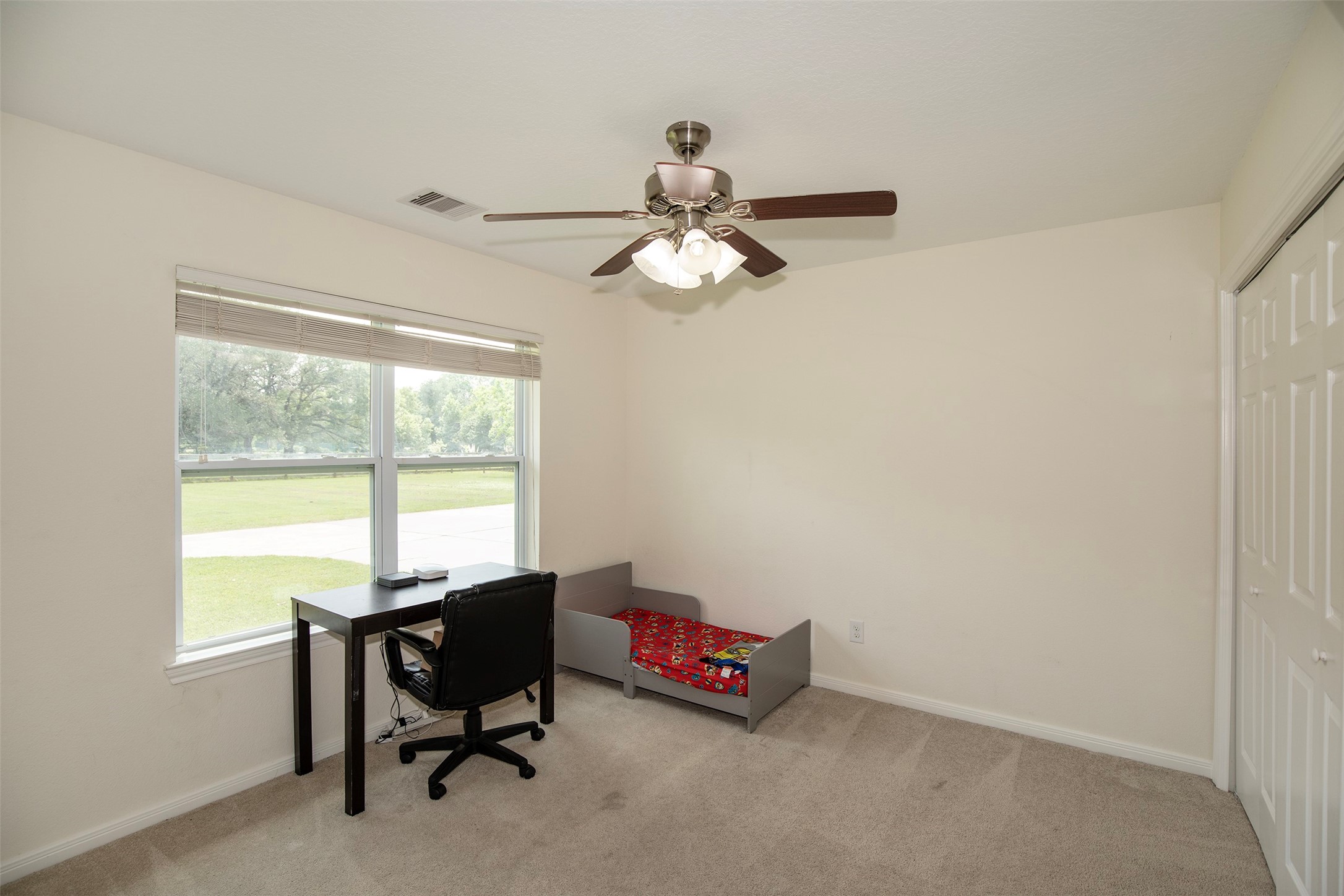 6105 Del Bello Boulevard Manvel, TX 77578 - Photo 28 of 37 a living room with furniture and a window