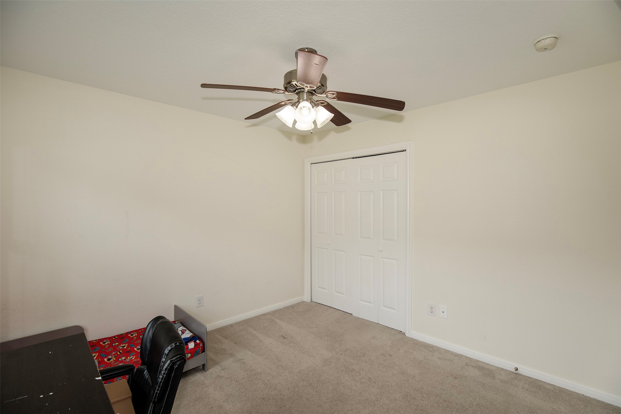 6105 Del Bello Boulevard Manvel, TX 77578 - Photo 29 of 37 a view of a chandelier fan and closet in a room