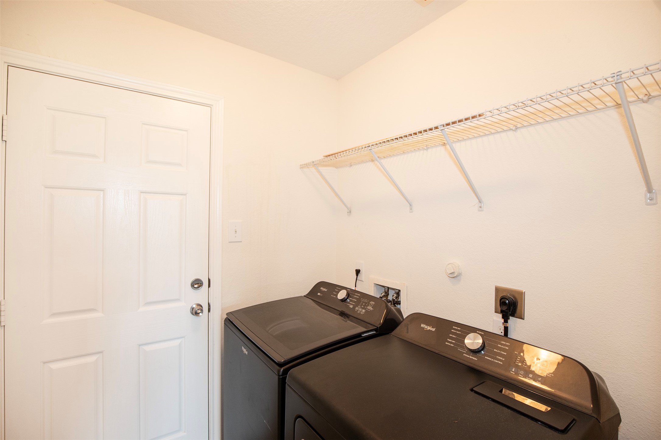 6105 Del Bello Boulevard Manvel, TX 77578 - Photo 30 of 37 a room with storage and utility