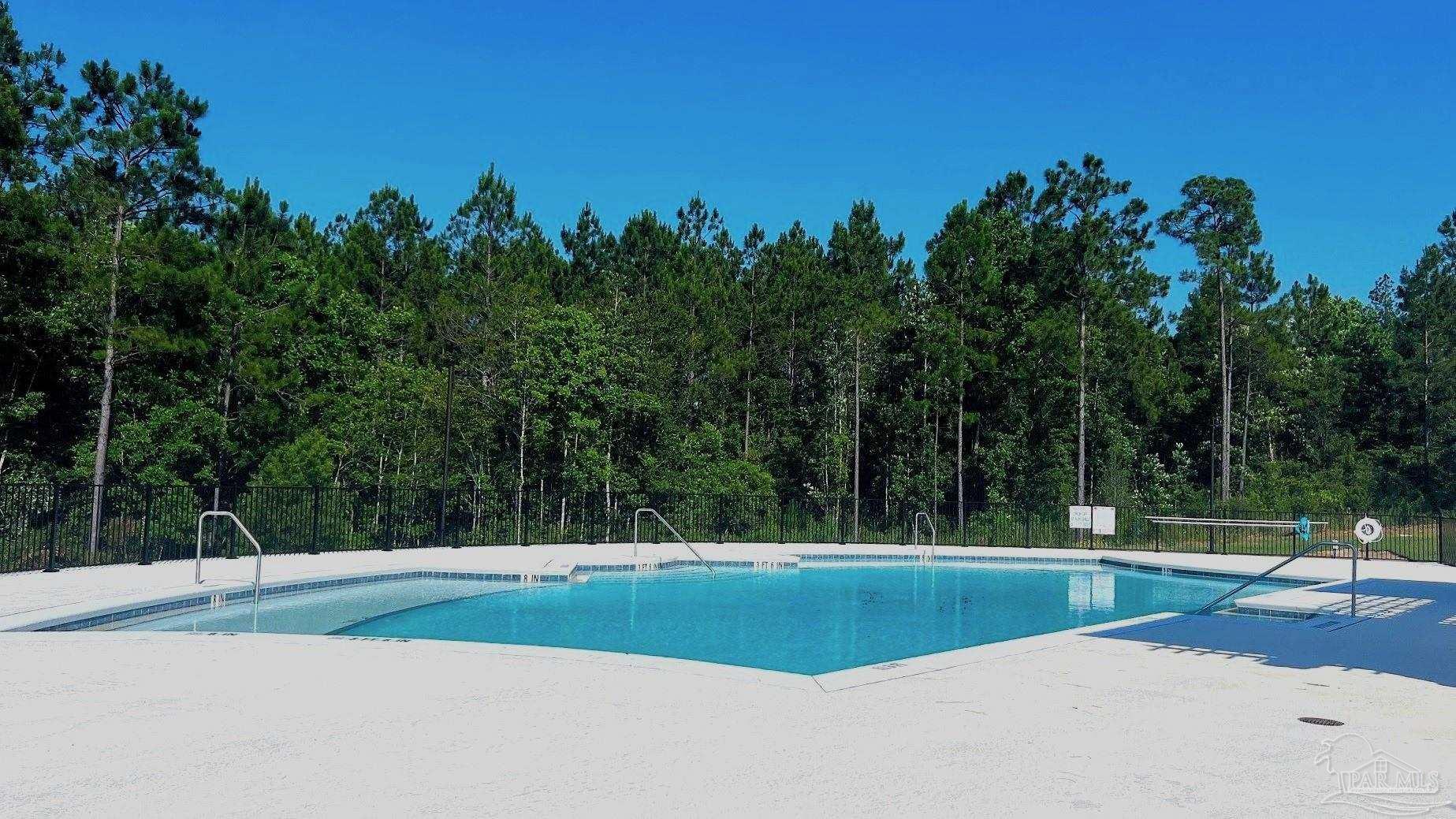 3543 Fallschase Boulevard Pensacola, FL 32526 - Photo 3 of 32 a view of a swimming pool