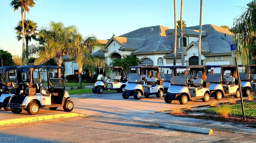 4709 Fairloop Run Lehigh Acres, FL 33973 - Photo 21 of 25 a view of street with tall buildings