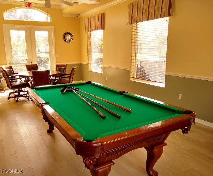 4709 Fairloop Run Lehigh Acres, FL 33973 - Photo 24 of 25 a room with pool tables and windows