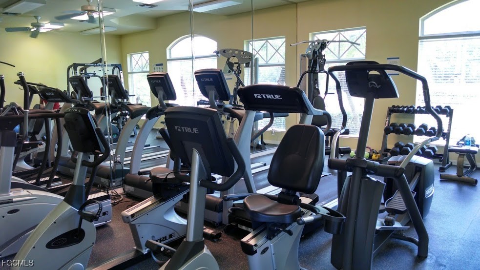 4709 Fairloop Run Lehigh Acres, FL 33973 - Photo 25 of 25 a view of a room with gym equipment