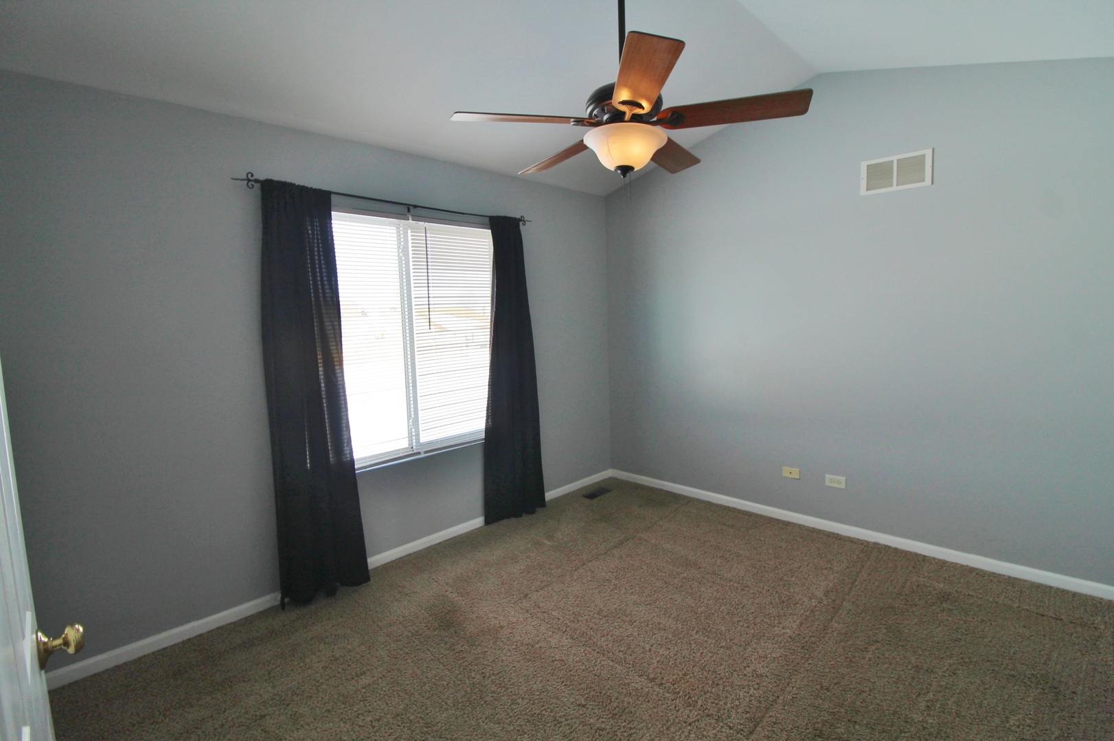 651 Chestnut Ridge Minooka, IL 60447 - Photo 21 of 33 an empty room with a window