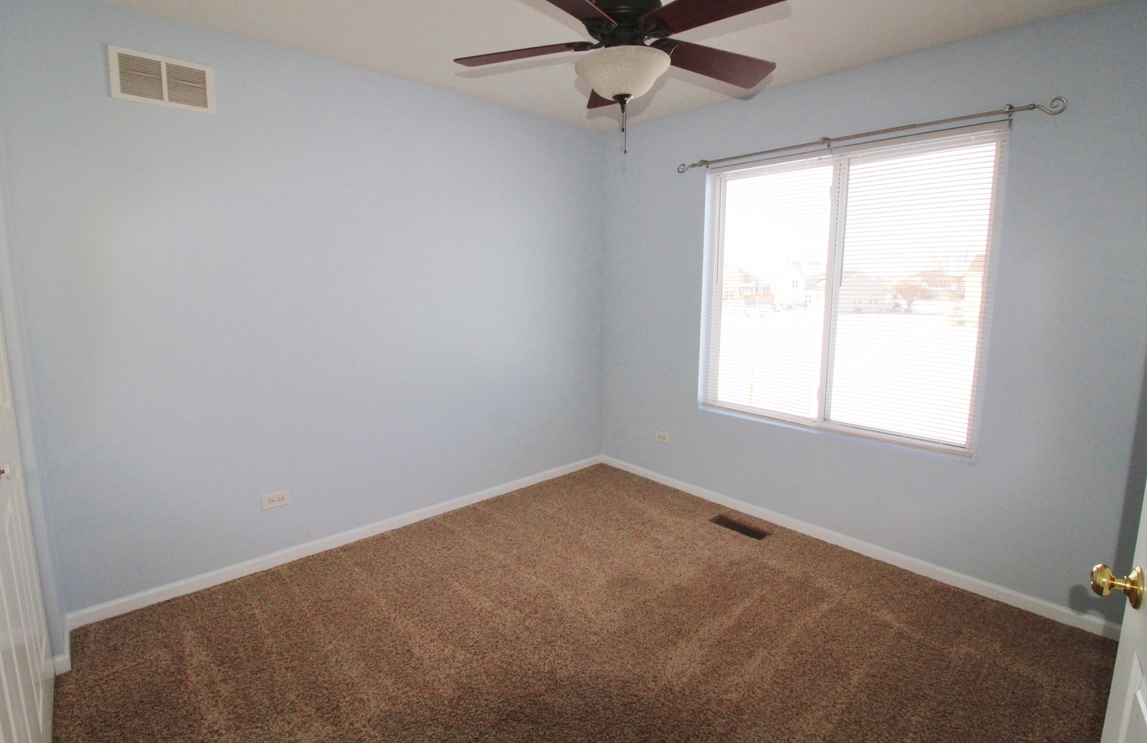 651 Chestnut Ridge Minooka, IL 60447 - Photo 25 of 33 an empty room with a window