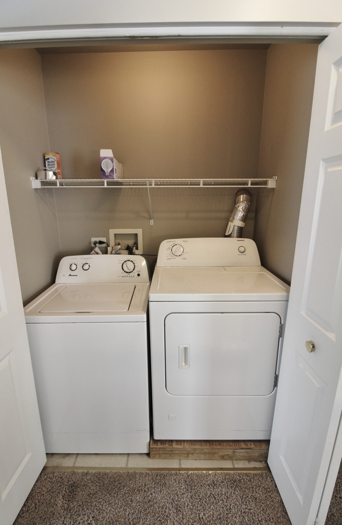 651 Chestnut Ridge Minooka, IL 60447 - Photo 27 of 33 a utility room with dryer and washer