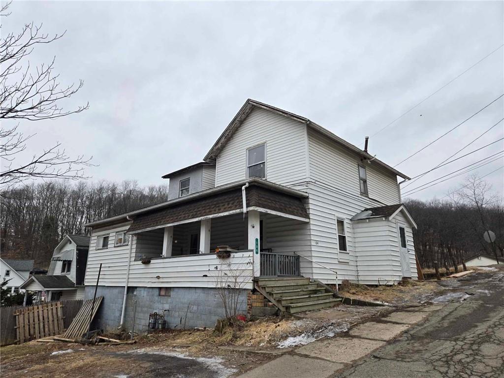 104 Forrest Street Petrolia, PA 16050 - Photo 1 of 22 a front view of a house with garage