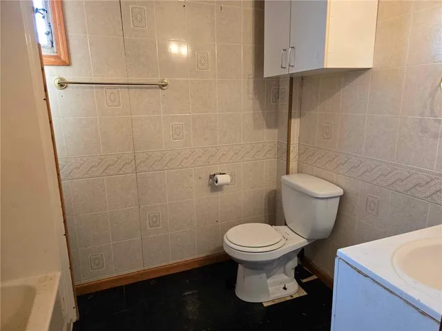 a bathroom with a sink and a toilet