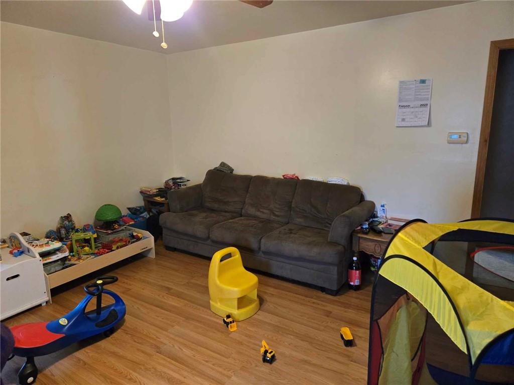 104 Forrest Street Petrolia, PA 16050 - Photo 4 of 22 a living room with furniture and a wooden floor