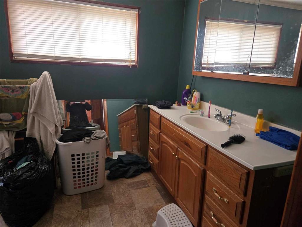 104 Forrest Street Petrolia, PA 16050 - Photo 10 of 22 a room with a window a sink and a table