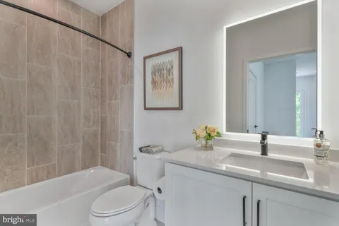 a front view of a house with large windows