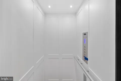 a view of a living room and dining room