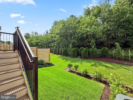 a view of a swimming pool and an outdoor space