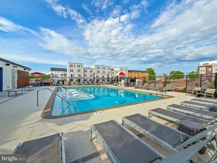 a view of multiple houses with a street