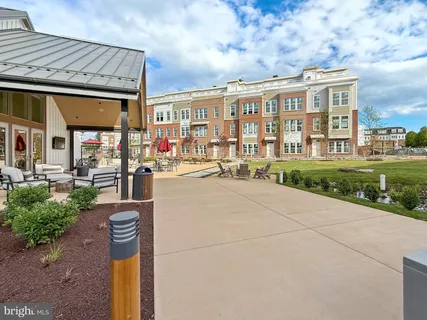 a city street lined with buildings and trees