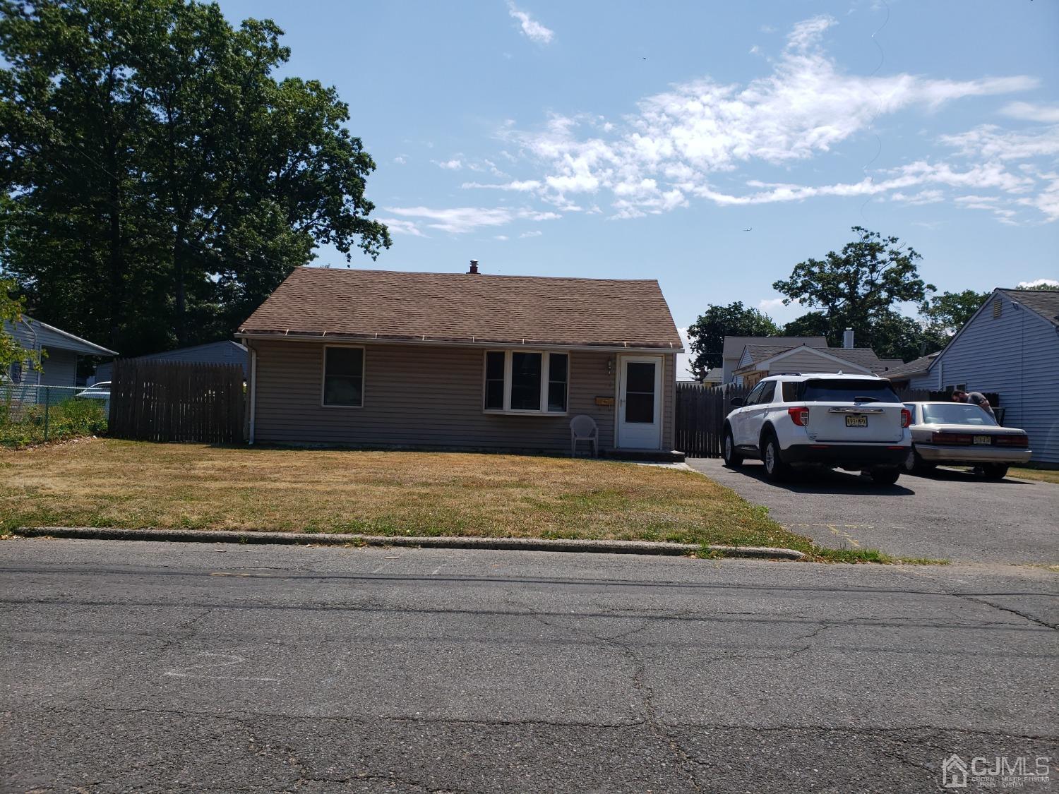 32 Crescent Road Edison, NJ 08817 - Photo 2 of 18 a house view with a garden space
