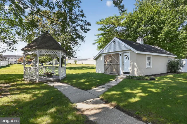 a view of backyard with green space