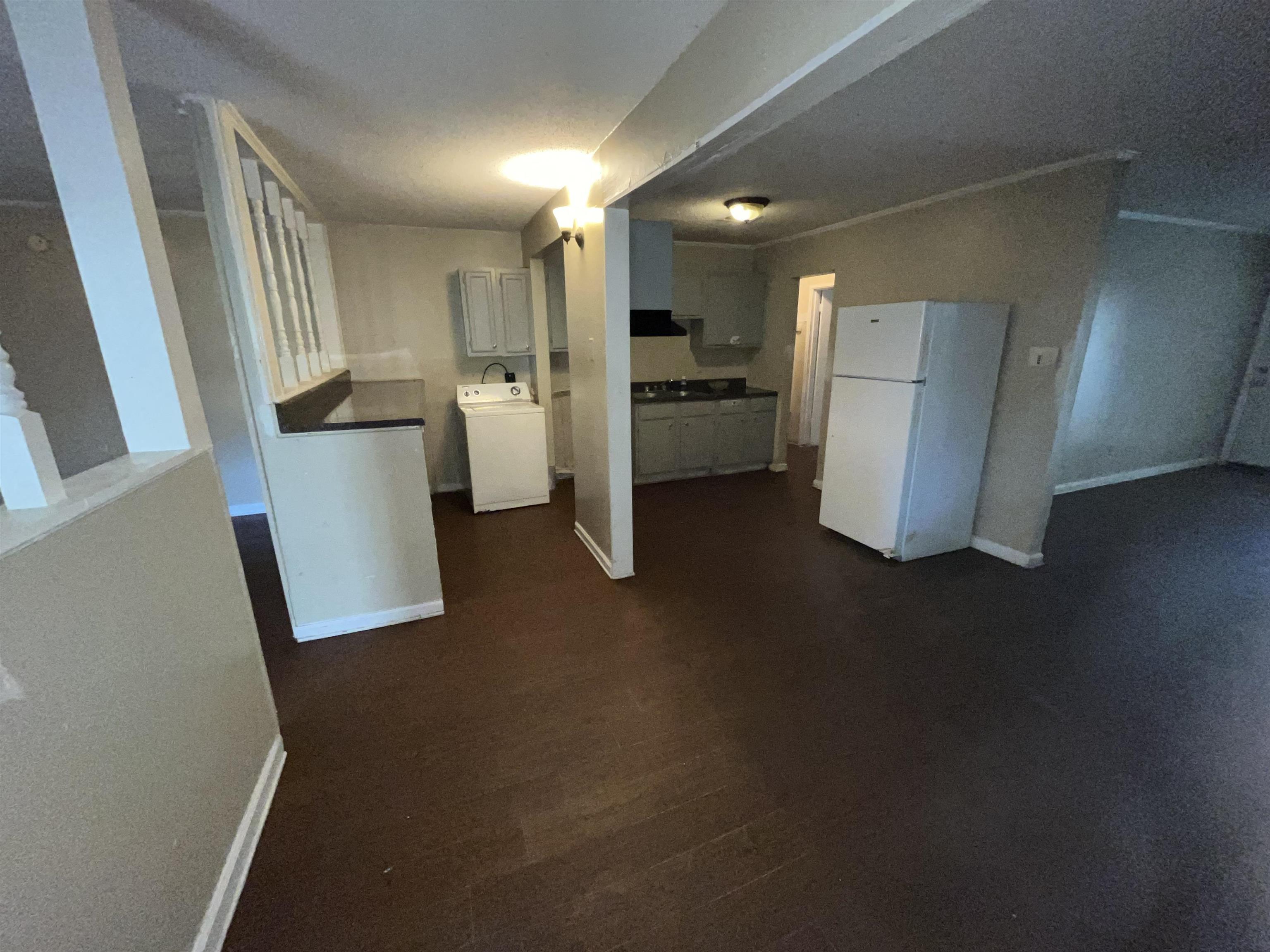 691 Delta Road Memphis, TN 38109 - Photo 7 of 25 a view of empty room with a kitchen