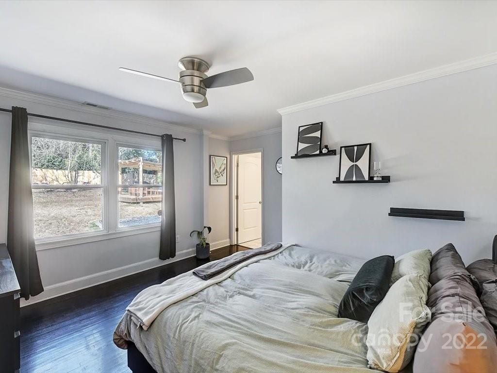 2734 Cowles Road Charlotte, NC 28208 - Photo 14 of 26 a bedroom with a bed and a window