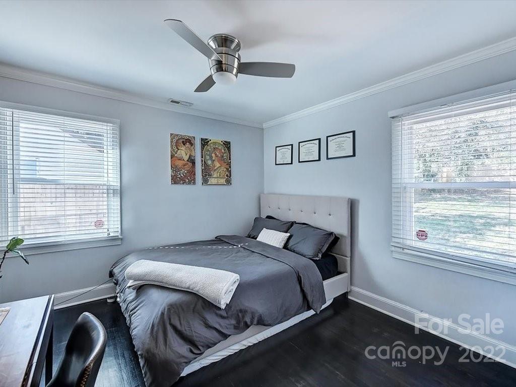 2734 Cowles Road Charlotte, NC 28208 - Photo 18 of 26 a bedroom with a bed and window