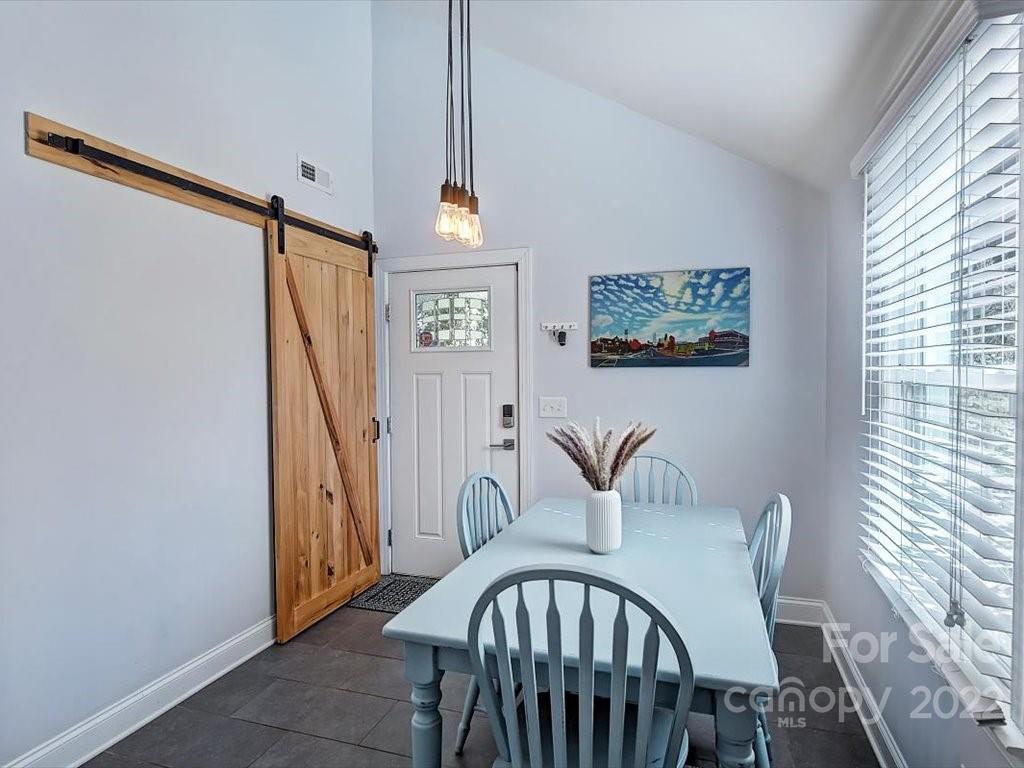 2734 Cowles Road Charlotte, NC 28208 - Photo 10 of 26 a view of a dining room with furniture and window