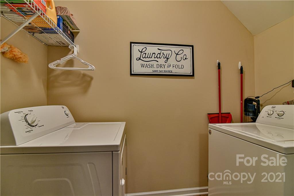 74 North River Road Fletcher, NC 28732 - Photo 12 of 29 a utility room with dryer and washer