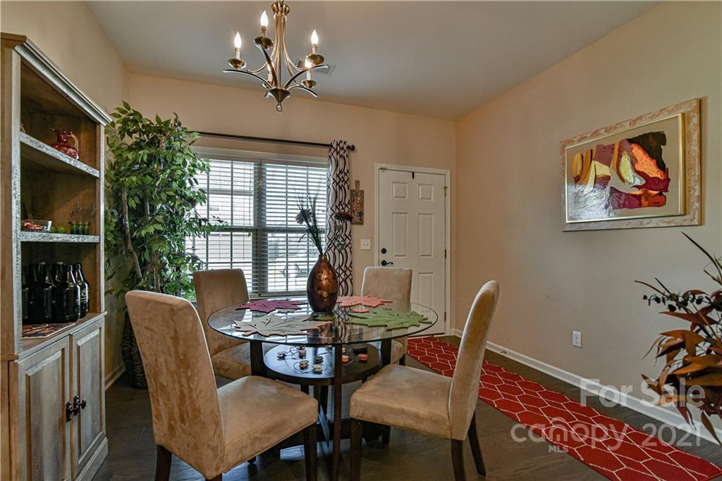 74 North River Road Fletcher, NC 28732 - Photo 9 of 29 a view of a dining room with furniture window and outside view