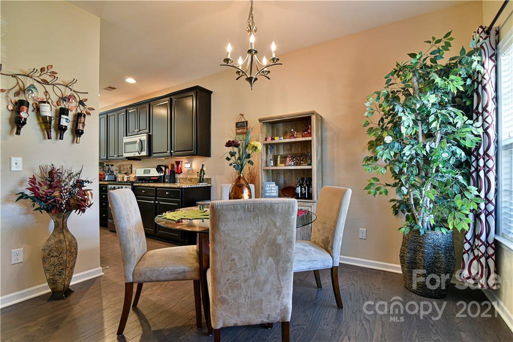 74 North River Road Fletcher, NC 28732 - Photo 10 of 29 a view of a dining room with furniture and chandelier