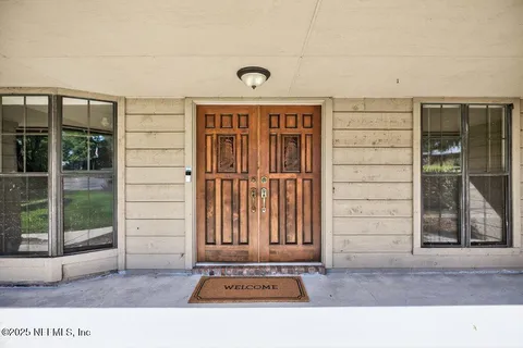 a front view of a building with a entryway