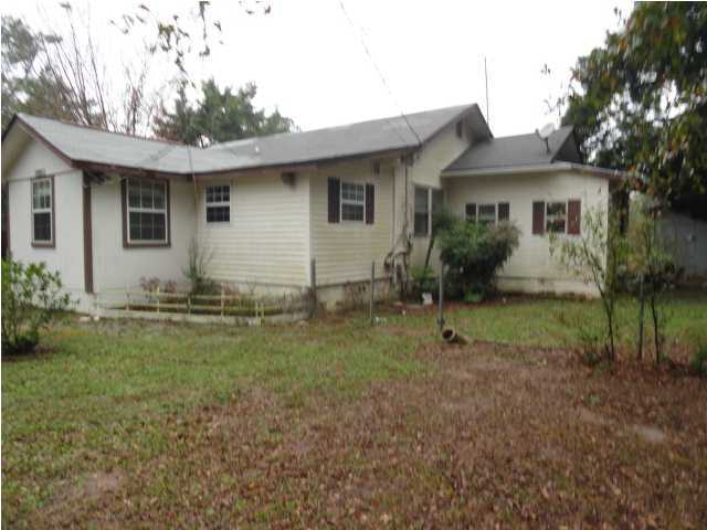 1121 Lighthouse Church Road Baker, FL 32531 - Photo 1 of 16 a house view with a backyard space