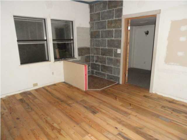 1121 Lighthouse Church Road Baker, FL 32531 - Photo 11 of 16 a view of empty room with wooden floor