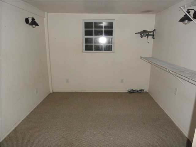 1121 Lighthouse Church Road Baker, FL 32531 - Photo 13 of 16 an empty room with windows