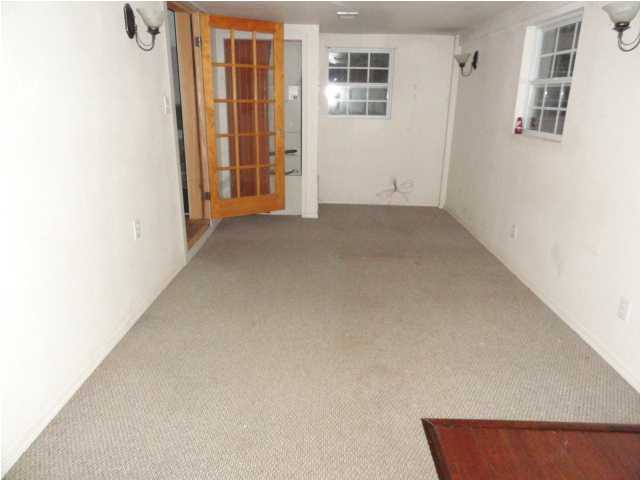 1121 Lighthouse Church Road Baker, FL 32531 - Photo 14 of 16 an empty room with windows