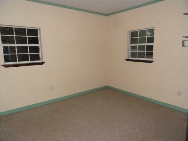 1121 Lighthouse Church Road Baker, FL 32531 - Photo 6 of 16 an empty room with a window
