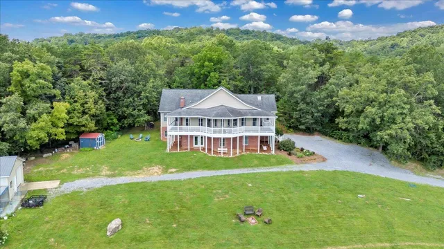 a view of a balcony with wooden floor