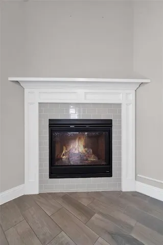 a living room with a fireplace