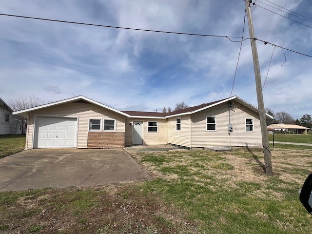 401 North Jackson Street Philo, IL 61864 - Photo 2 of 3 a house view with a outdoor space