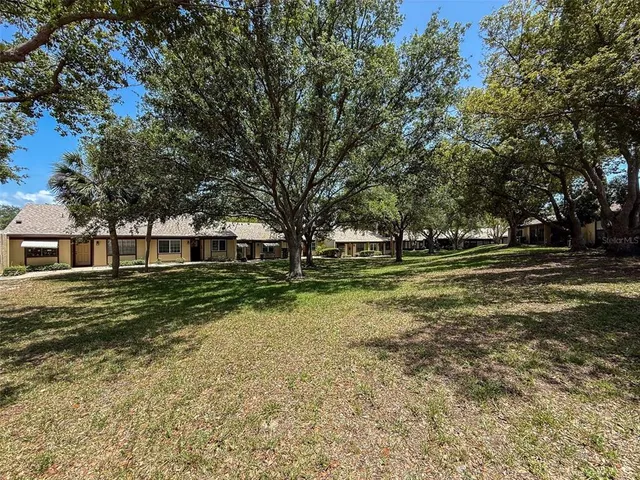 a view of a house with a big yard