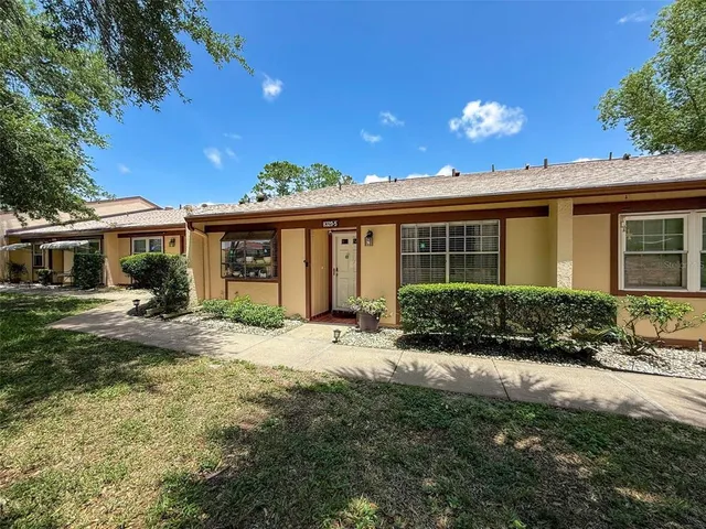 a view of a house with a patio